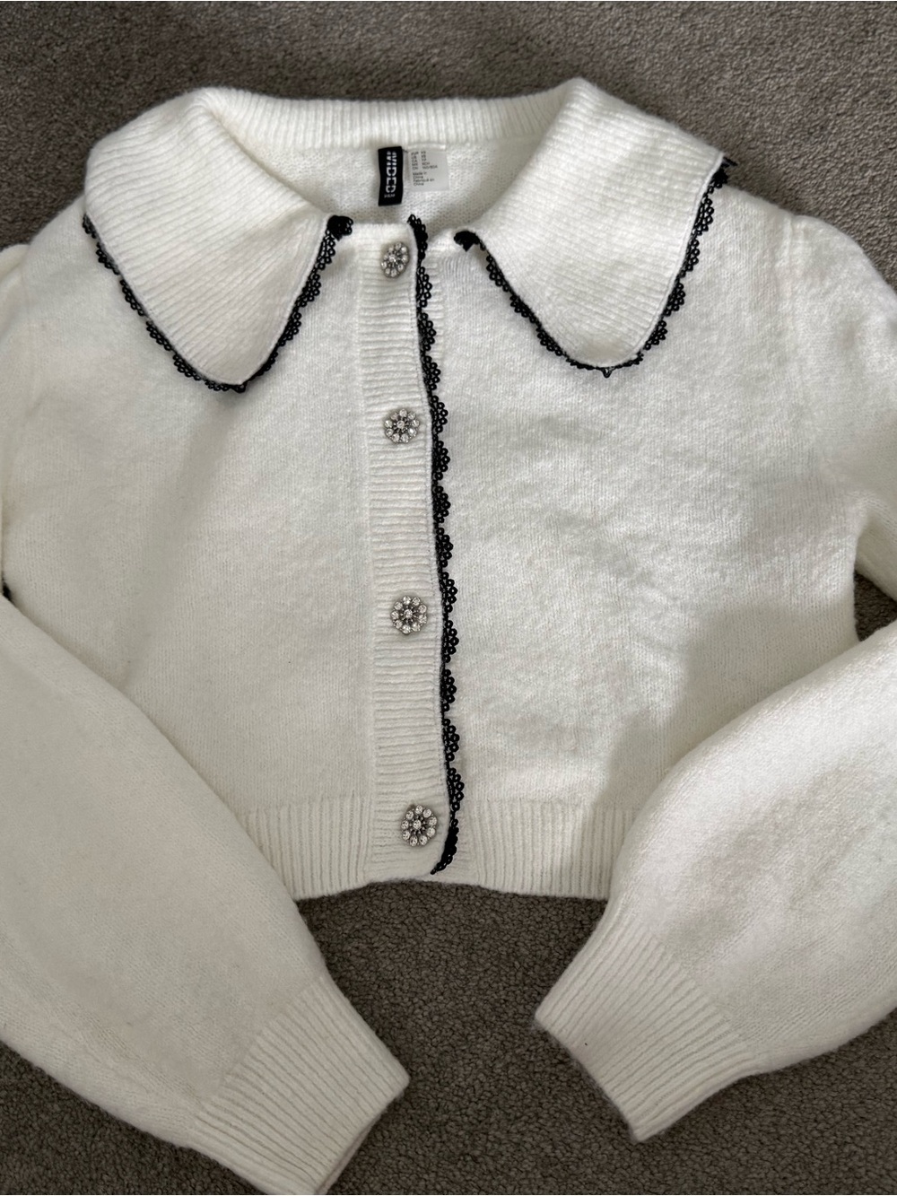 H&M White Cropped Cardigan with Black Lace Trim and Jewel Buttons (H&M)